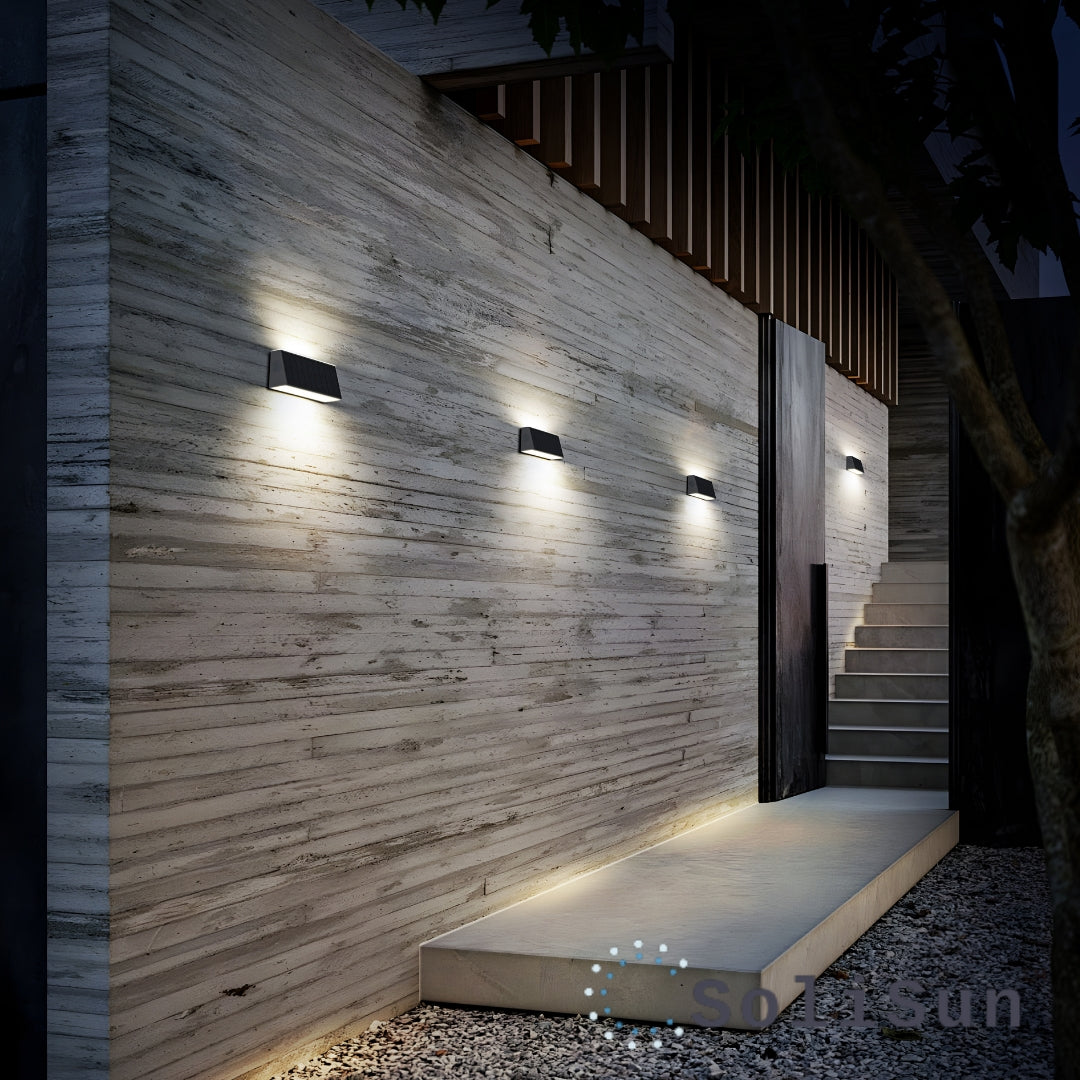 solar up down wall light on home