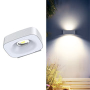 Modern solar wall light with hollow design mounted on wall

