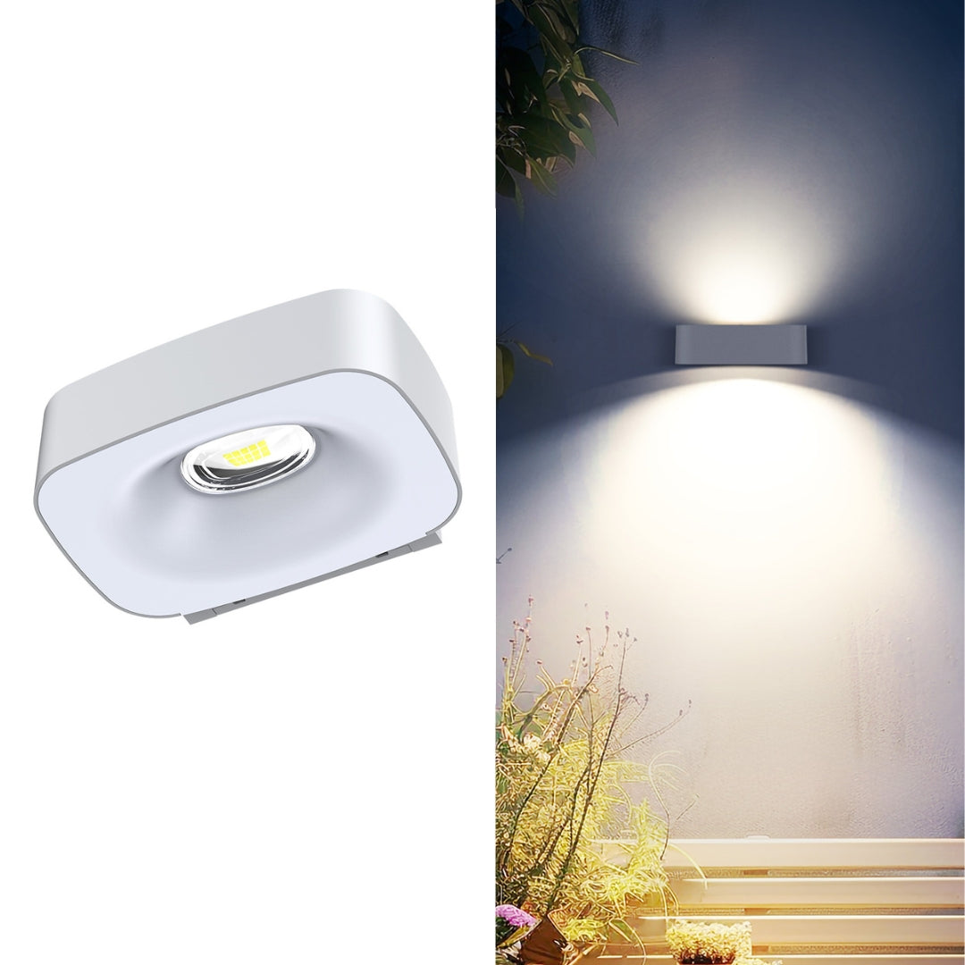 Modern solar wall light with hollow design mounted on wall

