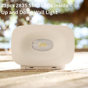 Up and Down solar Wall Light with 21pcs 2835 SMD LEDs on a blurred natural background