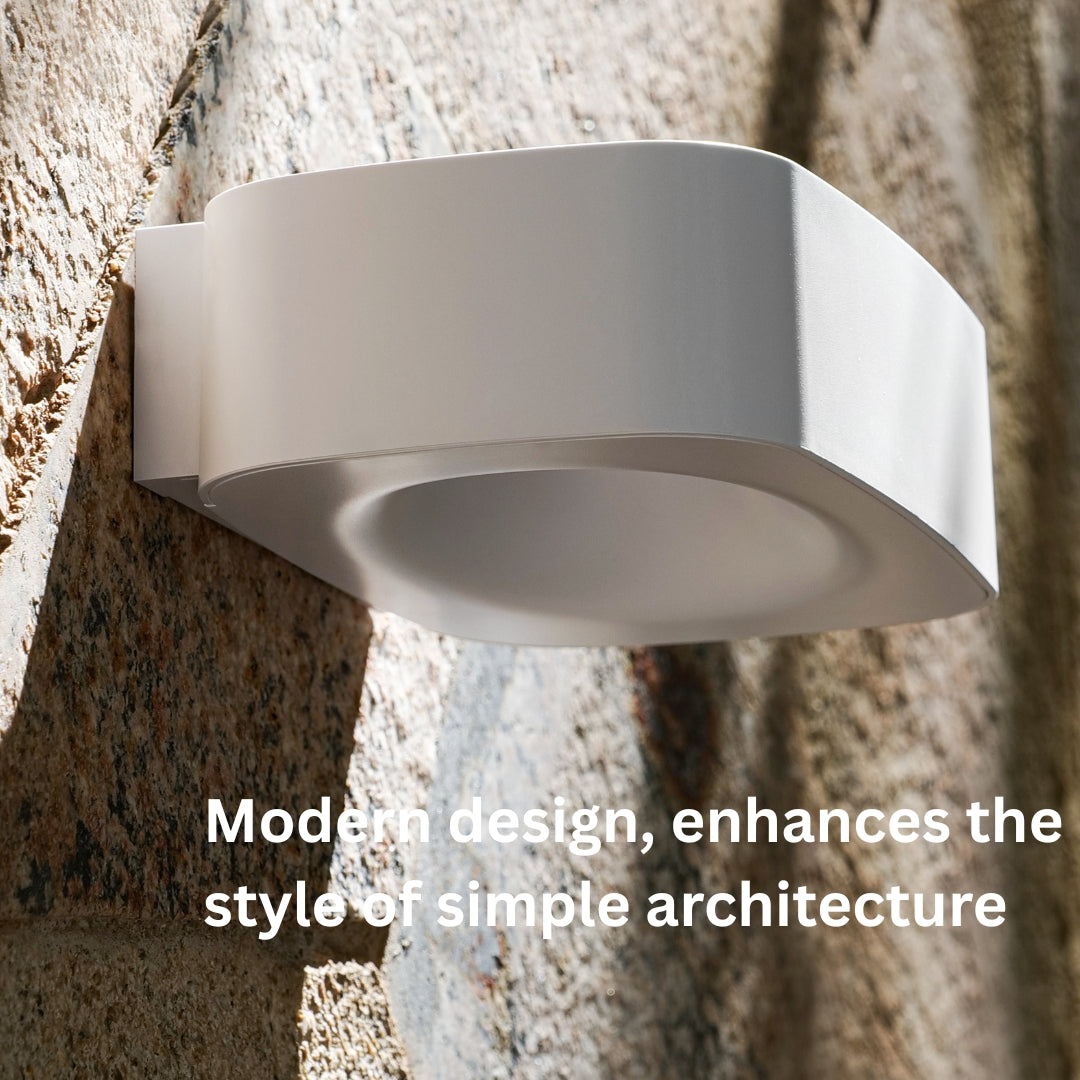 Modern outdoor solar wall light on a textured wall