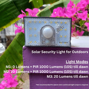 solar security light with motion sensor on a wall