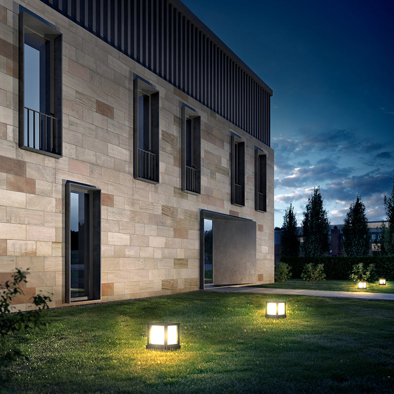Modern building exterior with decorative outdoor lights at night