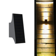 solar up and down wall light on a compound wall