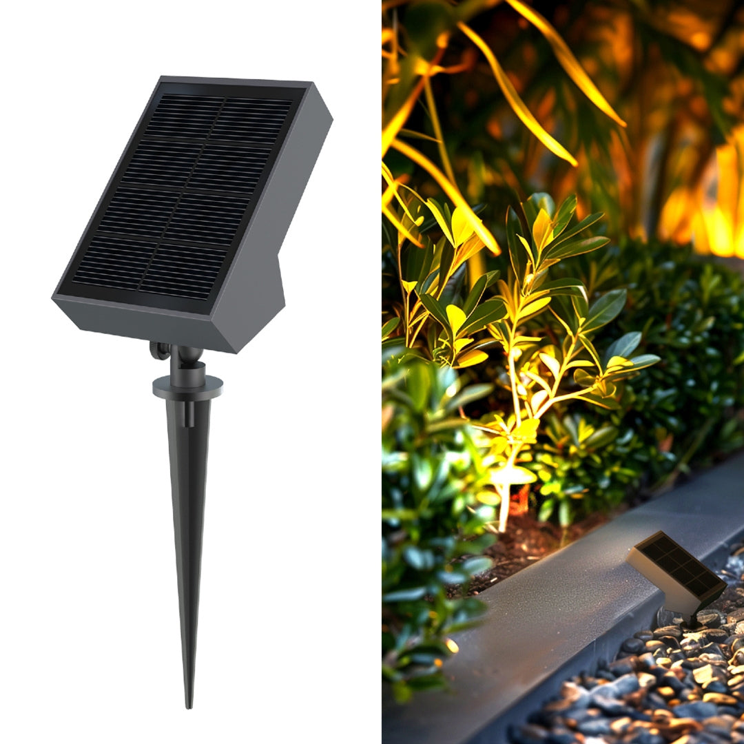 Solar powered pathway lights lining a stone walkway in a backyard