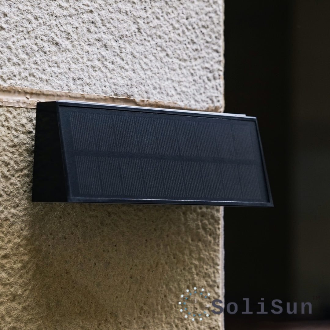 solar powered up and down lights with 700 lumens light output and 4 light modes
