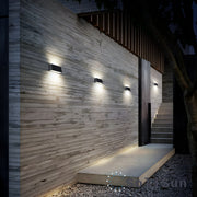 solar up down wall light on home