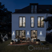 solar up and down wall lights on house